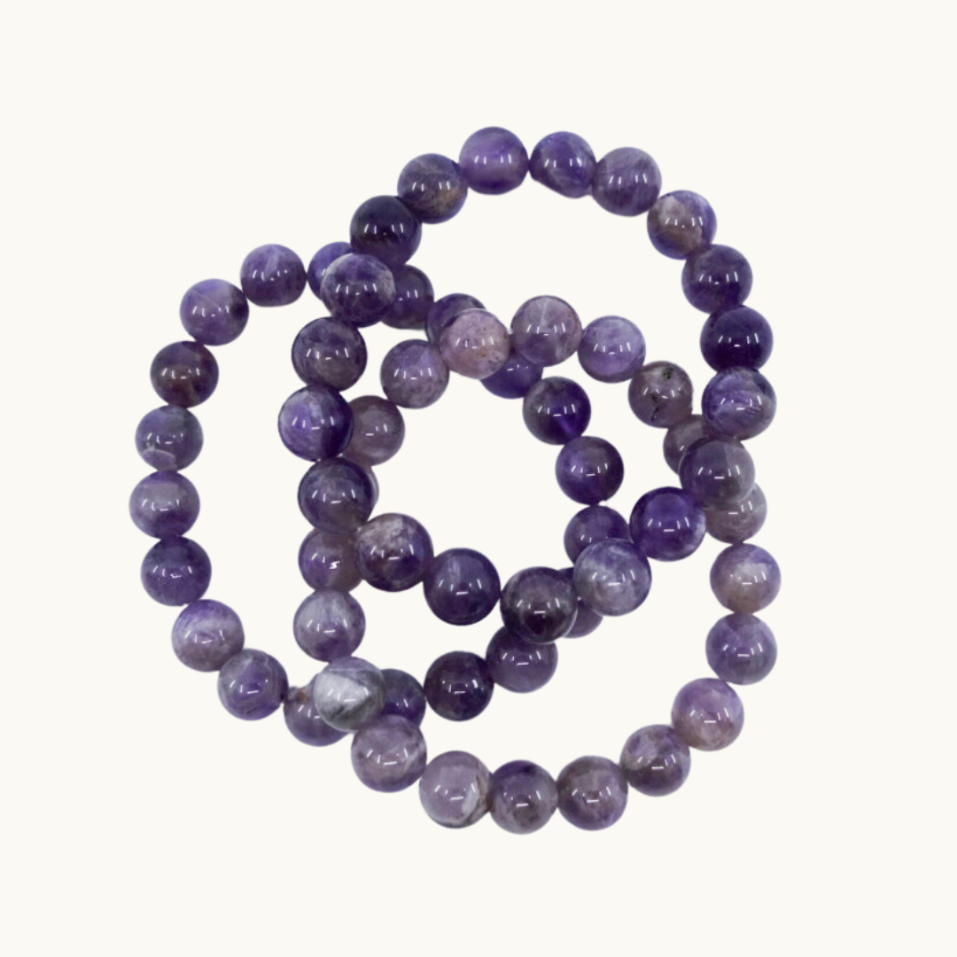 Amethyst Beaded Bracelets - Connect with your higher self with our Amethyst bracelets, known for enhancing intuition and spiritual connection. Available in 4mm, 8mm, and 10mm sizes, each bracelet is uniquely chosen for you.