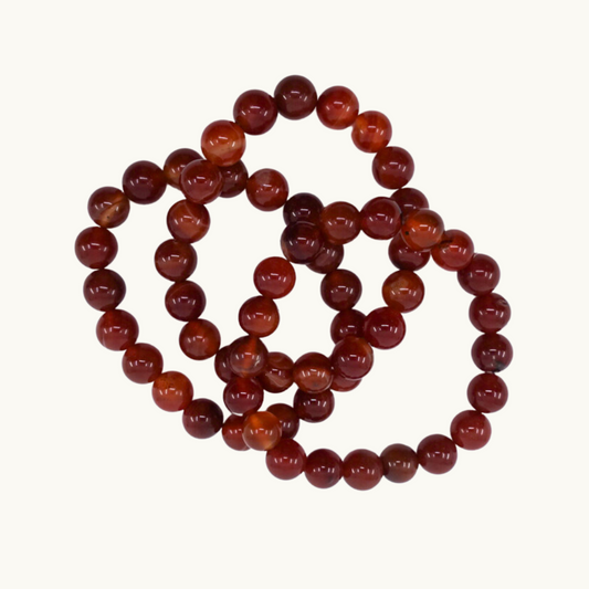 Carnelian Beaded Bracelets - Boost your confidence and courage with our Carnelian bracelets, perfect for enhancing vitality and creativity. Available in 4mm and 10mm sizes, each bracelet is uniquely chosen for you.