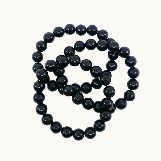 Black Onyx Beaded Bracelets - Experience mental discipline and protection with our Black Onyx bracelets, perfect for grounding and setting energetic boundaries. Available in matte 8mm and 10mm sizes, each bracelet is uniquely chosen for you.
