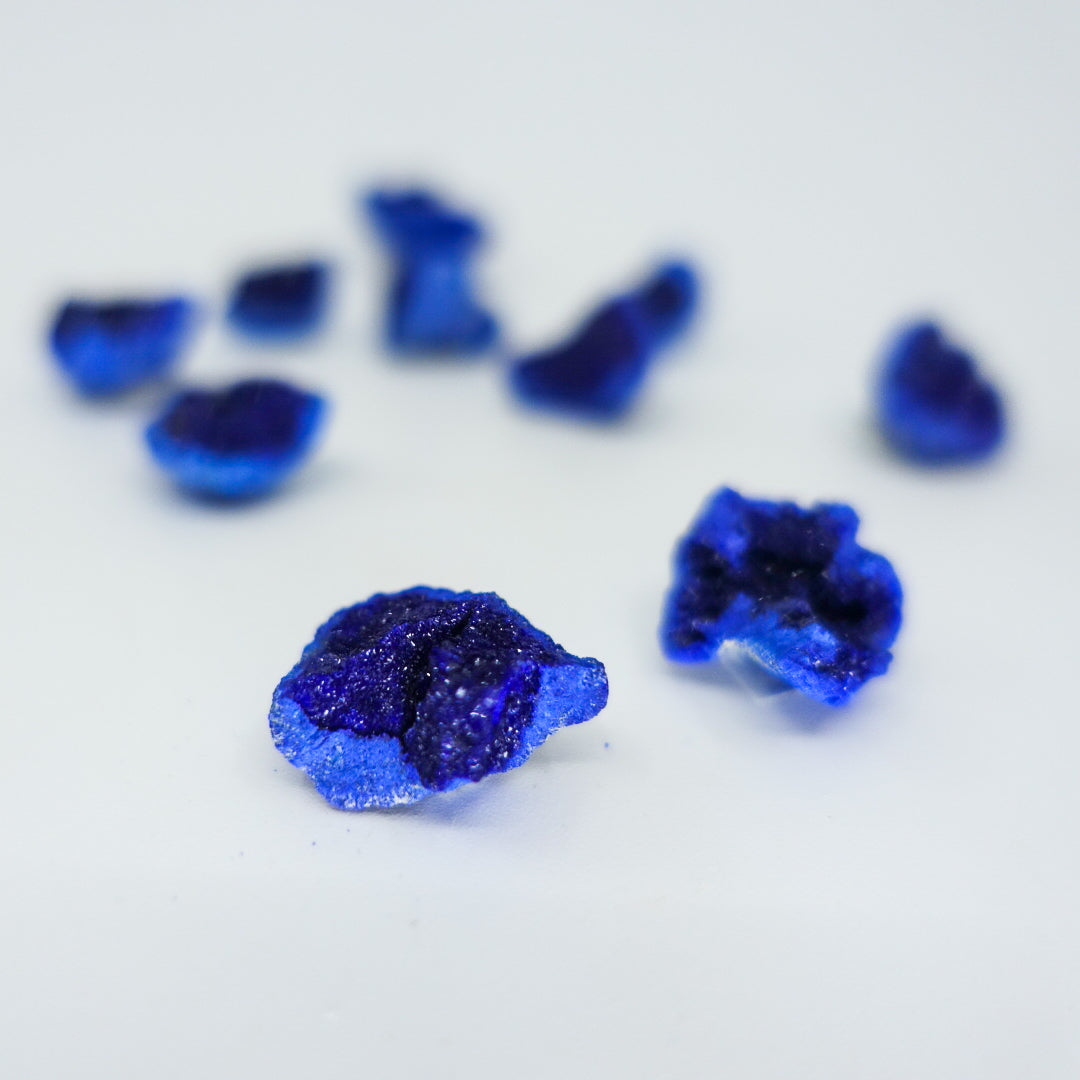 Vibrant blue Azurite crystal, approximately 0.75 inches in size, handpicked for you by Juniper Stones