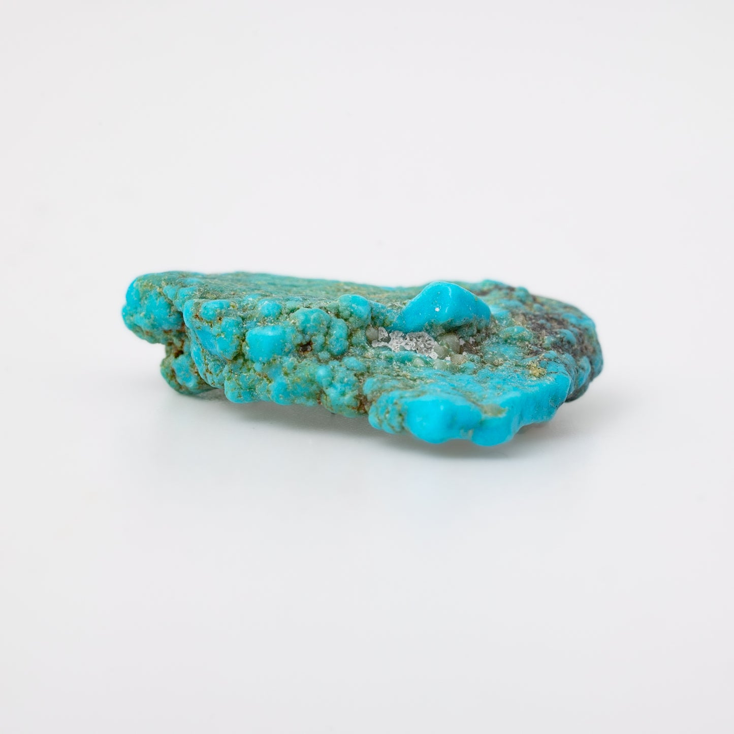 Natural Kingman Turquoise: Speak Your Truth with Heart Connection. Available in various sizes.