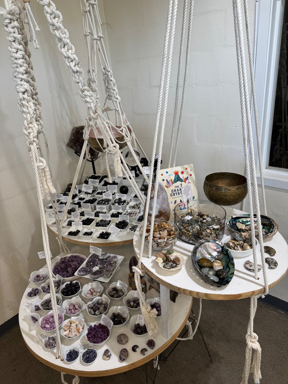 Glass display case and shelves at Juniper Stones