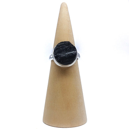 Raw black tourmaline ring representing negative energy cleansing and protection. Shop now