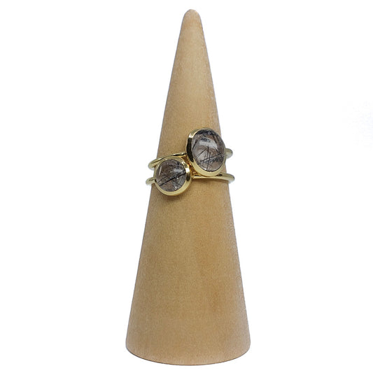 Gold tourmalinated quartz ring representing aura cleansing and balance. Shop now!