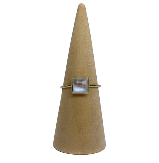 Dainty gold moonstone ring representing feminine mysteries and intuition. Shop now!