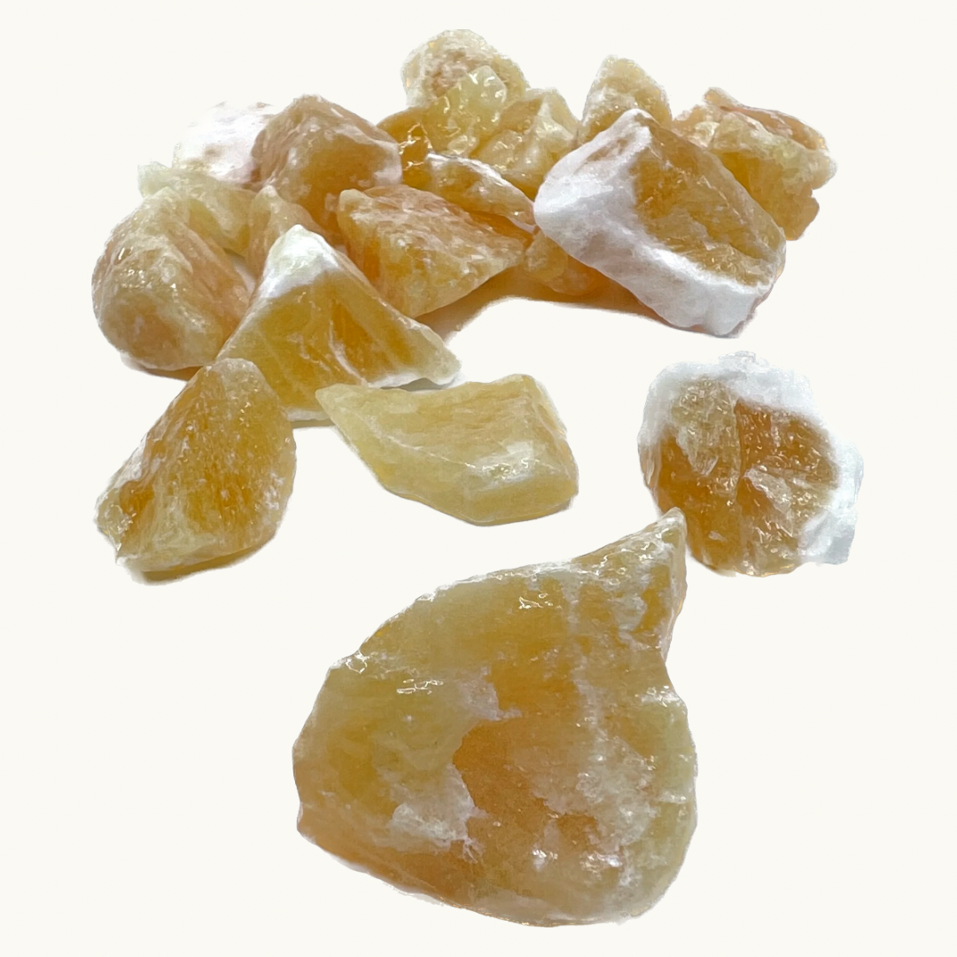 Orange Calcite Rough Crystal with Joyous Properties. Available in sizes ranging from 1" to 2".