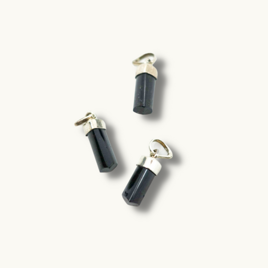 Black Tourmaline Pendant - Clear negativity and protect your energy field with our Black Tourmaline pendant. Stone roughly measures 0.5". Each pendant is uniquely chosen for you