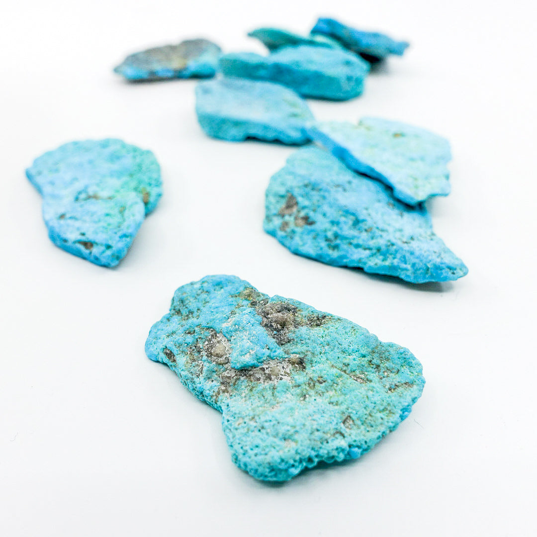 Natural Kingman Turquoise: Speak Your Truth with Heart Connection. Available in various sizes.