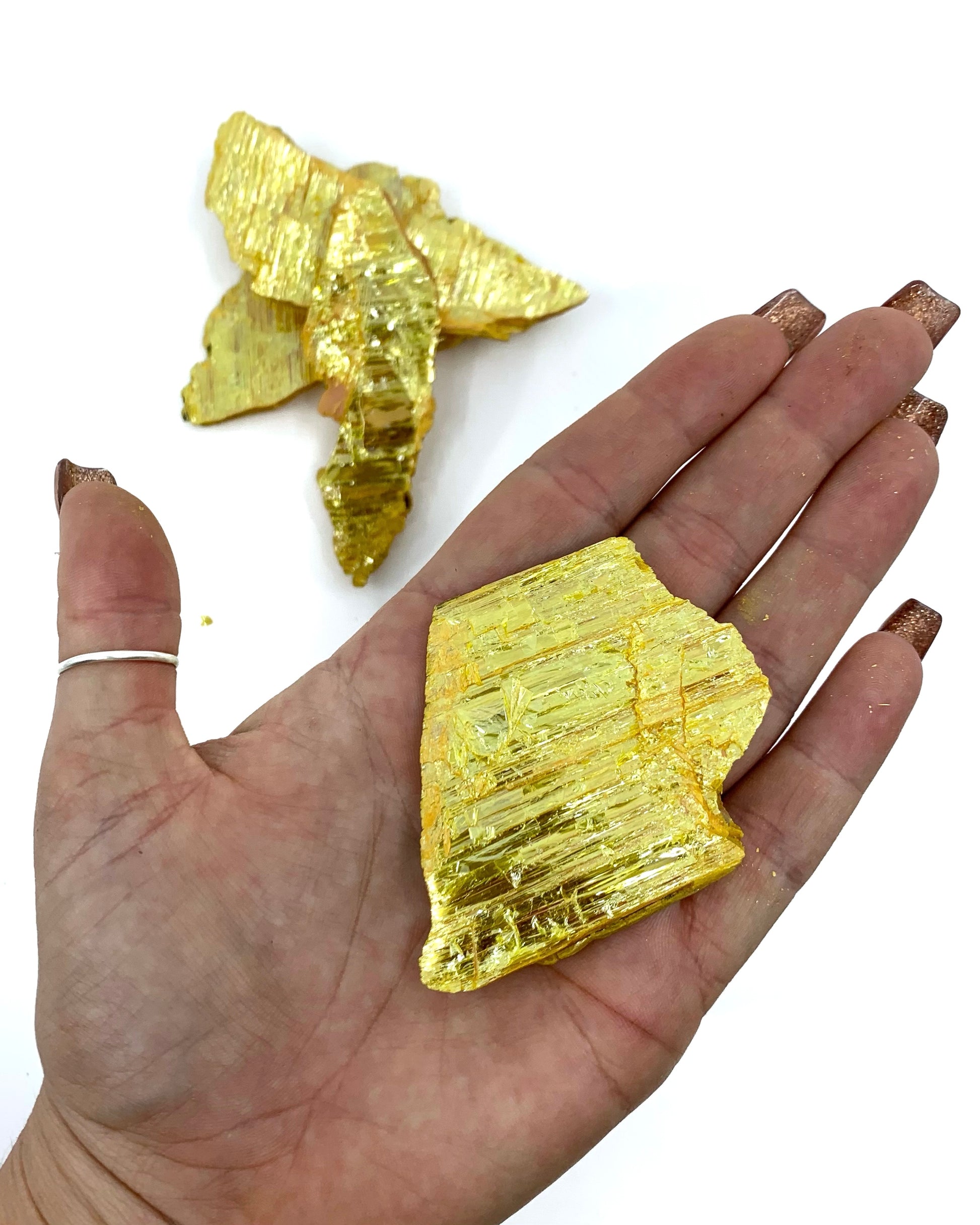Bright yellow Orpiment mineral. Sizes roughly measuring 3 inches and above