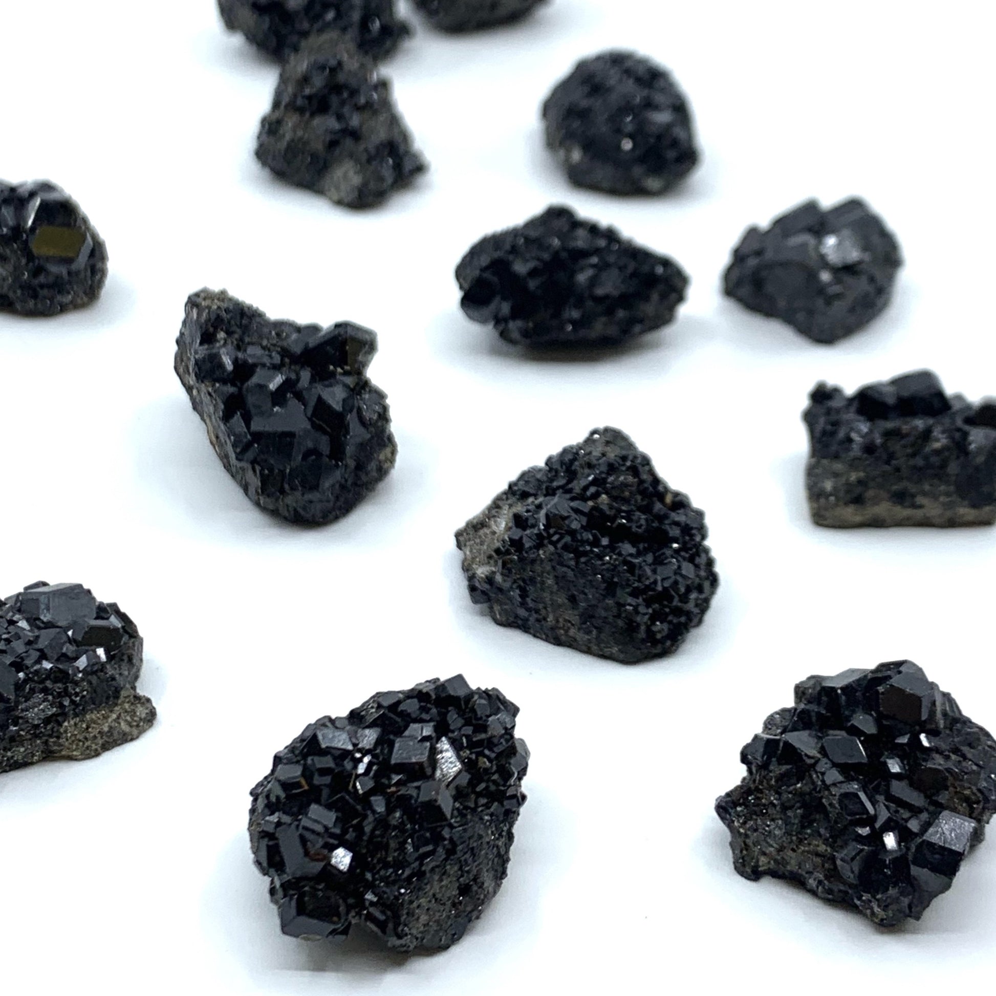 Black Garnet clusters, approximately 1 inch in size, handpicked for you by Juniper Stones.