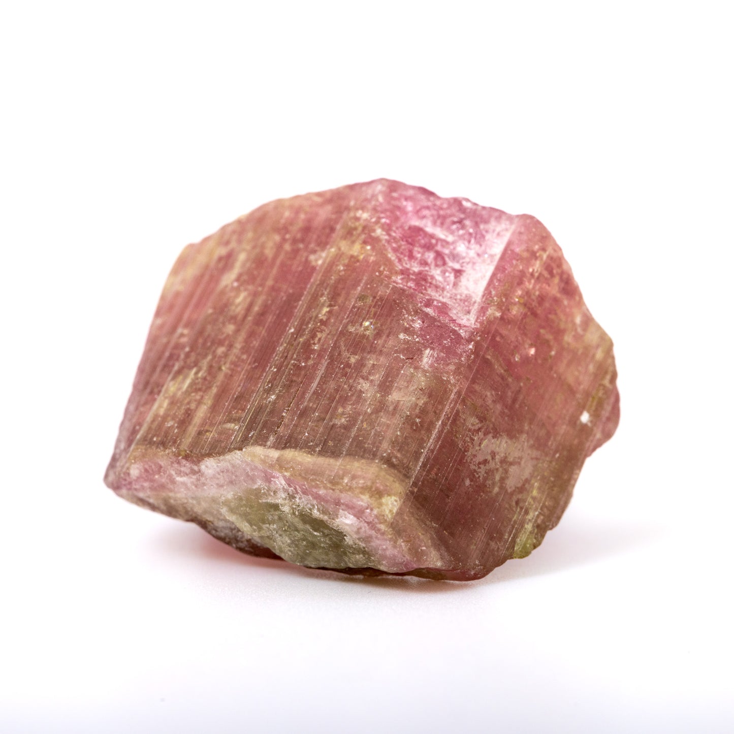 Watermelon tourmaline crystal, approximately measuring 1.5" x 1". Ideal for heart chakra activation, calming energy, and healing. Shapes and sizes may vary.